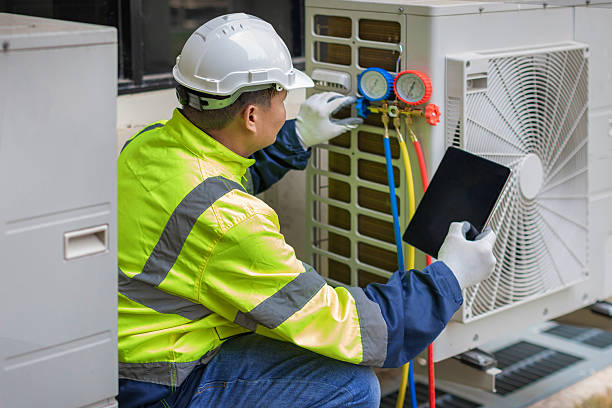 Professional Hvac technician working in Natrona Heights, PA